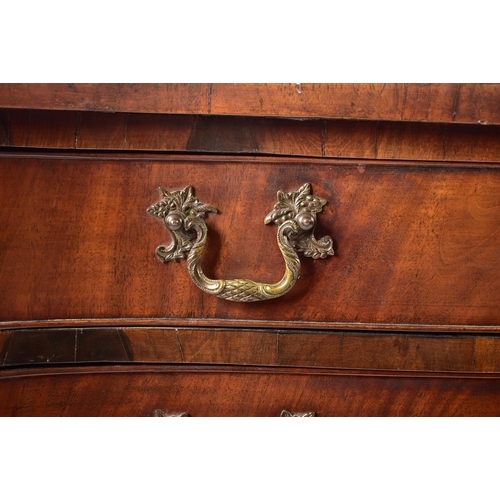 262 - A George III early 19th century mahogany serpentine fronted chest of drawers. The chest having a sha... 