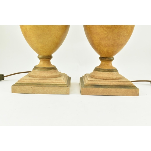 265 - Porta Romana - A pair of painted baluster urn shaped desk table lamps. Each in cream & yellow colour... 