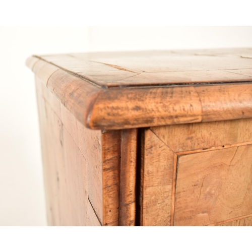 268 - A 17th century Queen Anne walnut chest of drawers. The chest having a crossbanded top with geometric... 