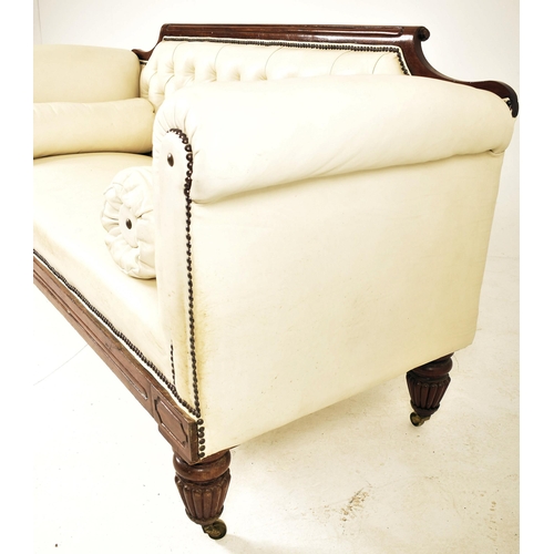 275 - An early Victorian 19th century mahogany framed & white leather three seater sofa. The sofa having a... 