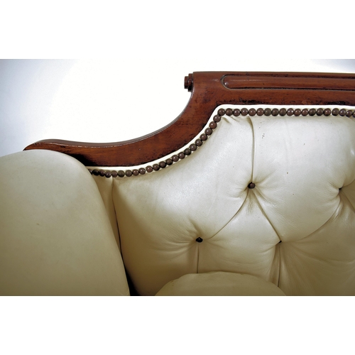 275 - An early Victorian 19th century mahogany framed & white leather three seater sofa. The sofa having a... 