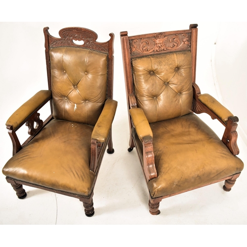 277 - A near matched pair of late Victorian carved oak & leather gentleman's library armchairs. The lot co... 