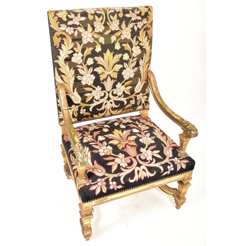 283 - A late 18th century continental gilt wood upholstered throne hall chair. The armchair having a strai... 