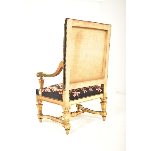 283 - A late 18th century continental gilt wood upholstered throne hall chair. The armchair having a strai... 