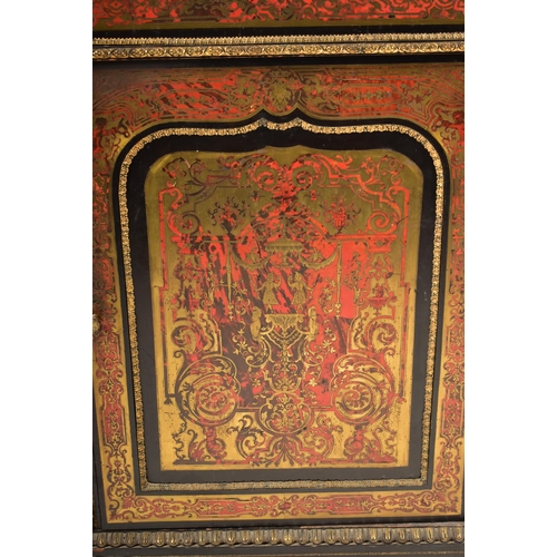 287 - A French 19th century boulle work ebonised & red lacquered credenza. The credenza having a break fro... 