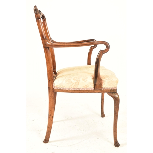 293 - A 19th century rosewood & brass inlaid armchair desk office chair. The armchair having a shaped back... 