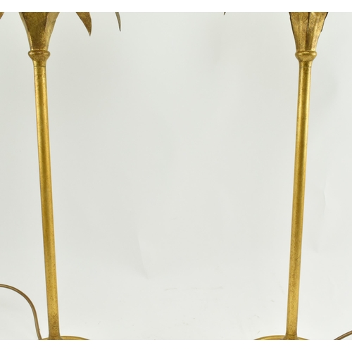 298 - Porta Romana - A pair of toleware style gilded metal palm shaped desk table lamps. Each lamp having ... 