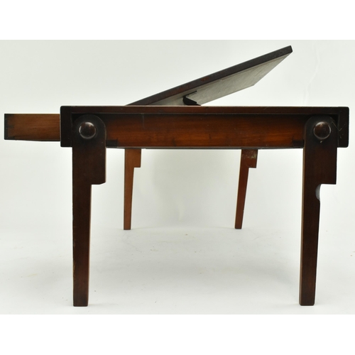 315 - A 19th century Victorian mahogany campaign folding bed table. The rectangular mahogany tray with rai... 