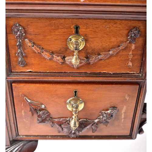 319 - A Robert Adams revival mahogany writing desk table. The desk having a central writing skiver surroun... 