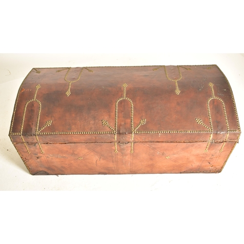 345 - A George III late 18th century brass & leather studded dome top travelling trunk chest. The trunk in... 