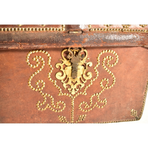 345 - A George III late 18th century brass & leather studded dome top travelling trunk chest. The trunk in... 