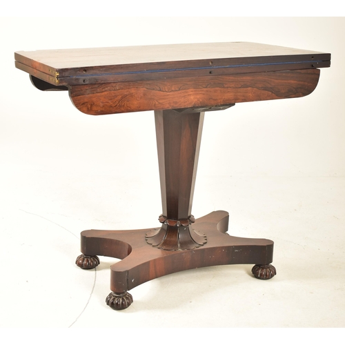 347 - A William IV 19th century rosewood card / games table. Raised on a quatrefoil base with bun feet. Ta... 