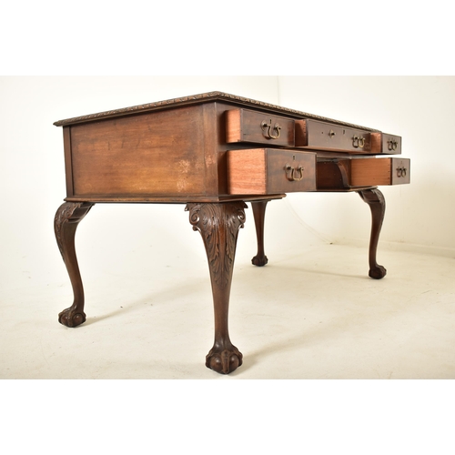 356 - Gill & Reigate of London - An early 20th century mahogany Queen Anne revival partners writing desk. ... 