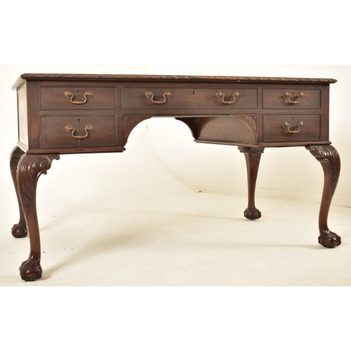 356 - Gill & Reigate of London - An early 20th century mahogany Queen Anne revival partners writing desk. ... 