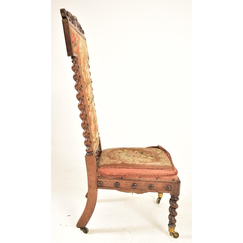 359 - A Victorian 19th century carved rosewood prie dieu prayer chair. The chair having a carved foliate s... 