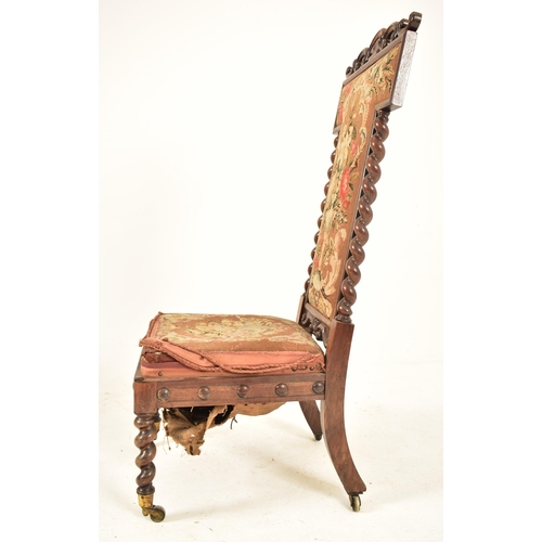 359 - A Victorian 19th century carved rosewood prie dieu prayer chair. The chair having a carved foliate s... 