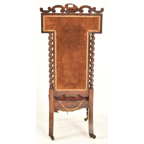 359 - A Victorian 19th century carved rosewood prie dieu prayer chair. The chair having a carved foliate s... 