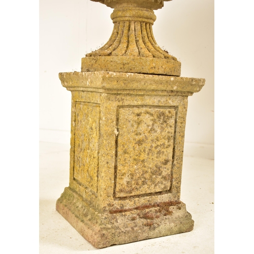 370 - A pair of carved reconstituted stone Neo-Classical manner garden planters. Each planter shaped like ... 