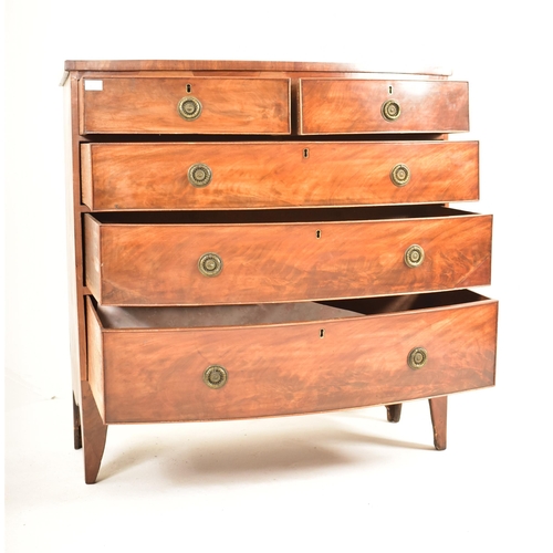 373 - A George III early 19th century flame mahogany bow fronted chest of drawers. The chest having a stra... 