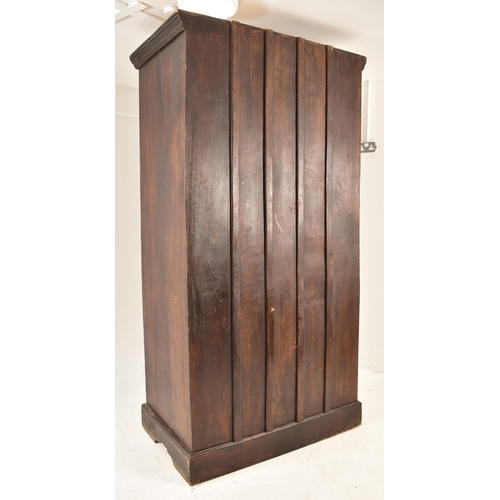 378 - An Indian inspired Sehhawati - Rajastan hardwood double door armoire wardrobe. The armoire having a ... 