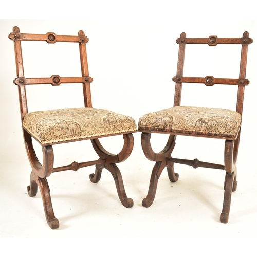 379 - A pair of late 19th century carved oak Gothic inspired Aesthetic Movement dining chairs. Each chair ... 