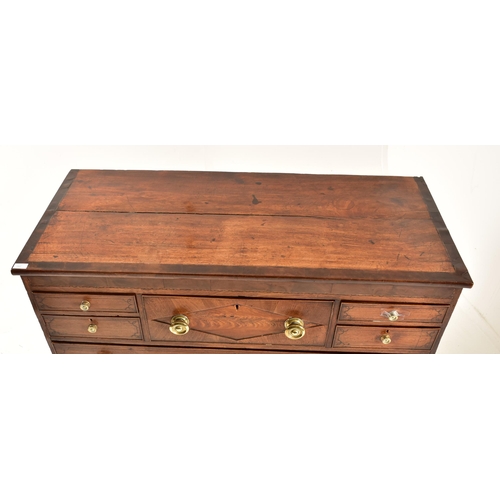 382 - A George III 19th century mahogany chest of drawers. The chest having a chamfered top over a central... 