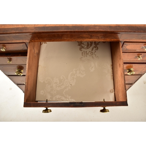 382 - A George III 19th century mahogany chest of drawers. The chest having a chamfered top over a central... 