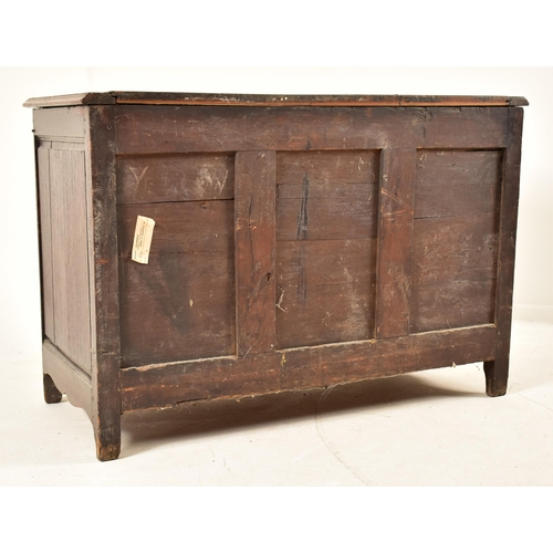 388 - A French 19th century oak commode / chest of drawers. The chest having a shaped top with chamfered e... 