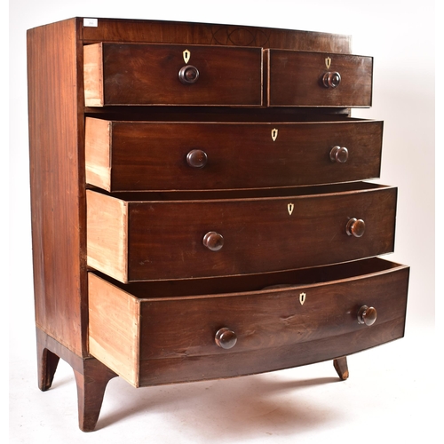 393 - A 19th century George III bow front line inlaid mahogany chest of drawers. Raised on French kick fee... 