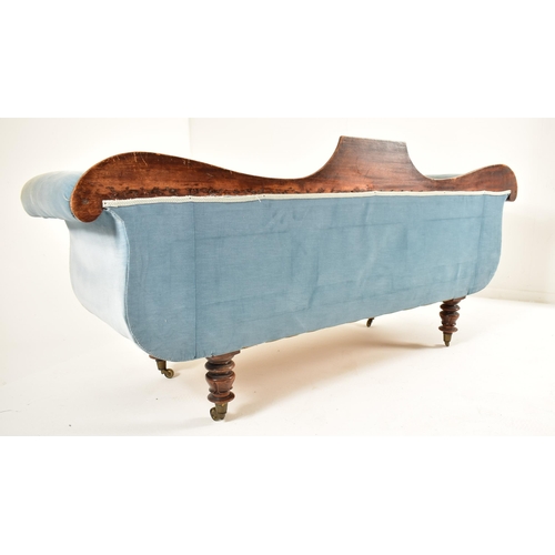 394 - A Victorian 19th century double scroll end Chesterfield mahogany framed sofa. The sofa having a shap... 