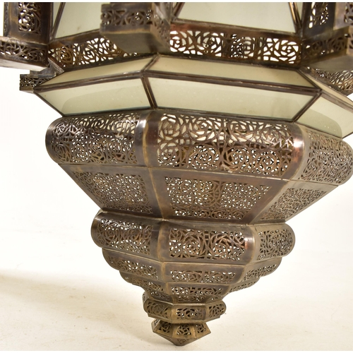 401 - A large Islamic inspired pierced metal & glazed Mosque temple ceiling lantern light. The lantern of ... 