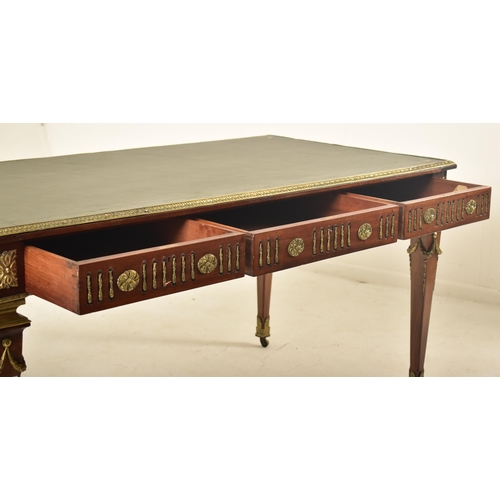 405 - Howard & Sons - A Victorian 19th century mahogany & ormolu rectangular writing desk. The desk having... 