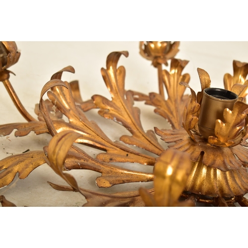 607 - An Italian inspired toleware style gilt metal six arm ceiling light. The chandelier having six arms ... 