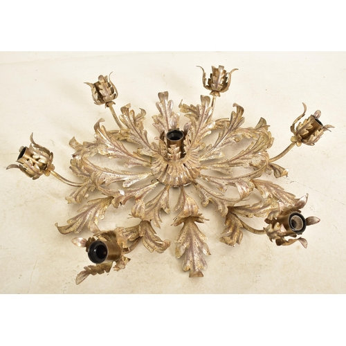 609 - An Italian inspired toleware style gilt metal six arm ceiling light. The chandelier having six arms ... 