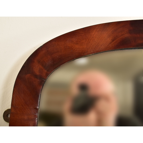 261 - A 19th century Victorian mahogany framed full length hanging hallway mirror. The mirror having of re... 