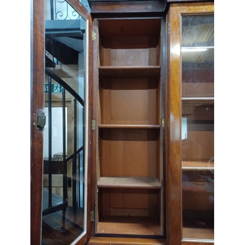 300 - A large 19th century Victorian mahogany breakfront library bookcase cabinet. Comprises a large centr... 