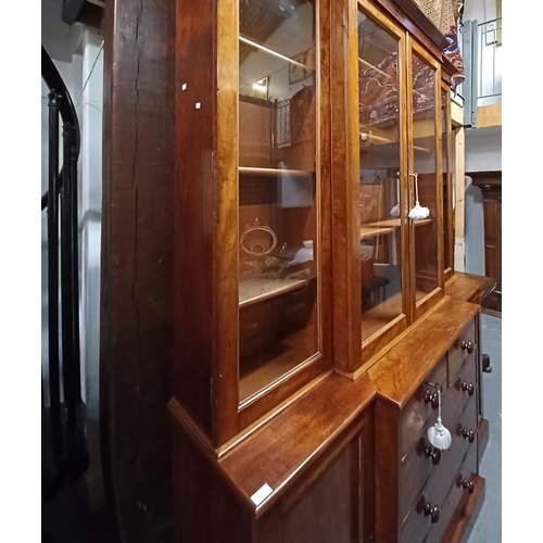 300 - A large 19th century Victorian mahogany breakfront library bookcase cabinet. Comprises a large centr... 