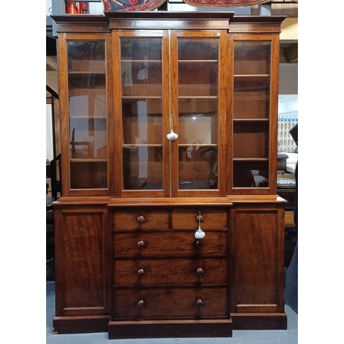 300 - A large 19th century Victorian mahogany breakfront library bookcase cabinet. Comprises a large centr... 