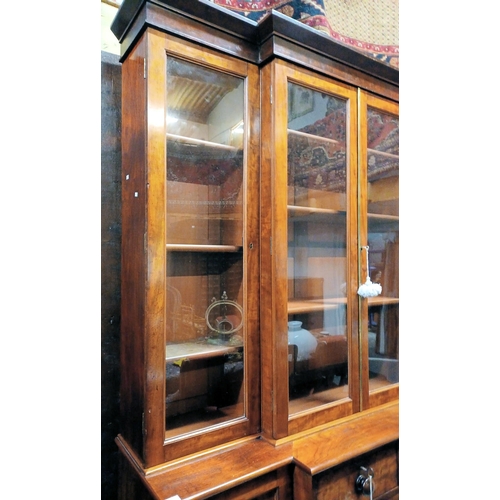 300 - A large 19th century Victorian mahogany breakfront library bookcase cabinet. Comprises a large centr... 