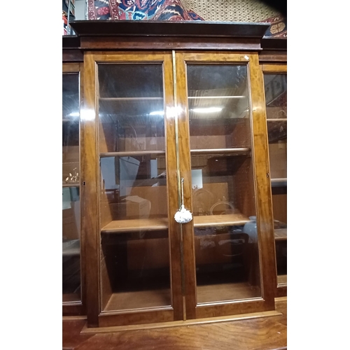 300 - A large 19th century Victorian mahogany breakfront library bookcase cabinet. Comprises a large centr... 