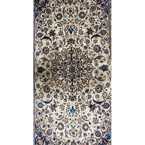 363 - An early 20th century Central Persian Islamic part silk Nain floor carpet rug. The rug having a cent... 