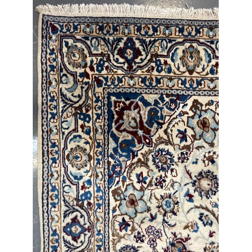 363 - An early 20th century Central Persian Islamic part silk Nain floor carpet rug. The rug having a cent... 