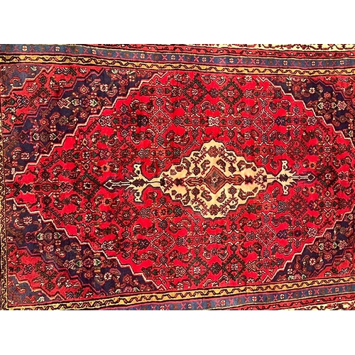 381 - A 20th century Central Persian Islamic Kashan floor carpet rug. The rug having a central medallion i... 