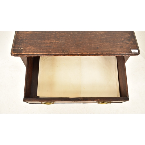 427 - A George III 18th century oak lowboy desk. The desk having single drawer to the frieze and with flar... 