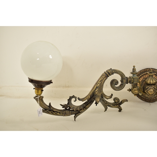 440 - An early 20th century circa 1900s French Art Nouveau cast metal twin arm wall light sconce. The ligh... 