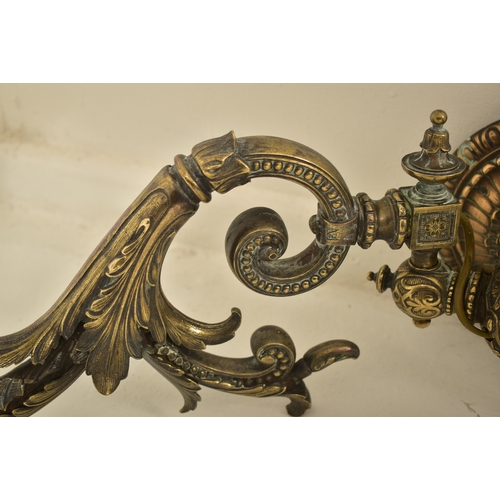 440 - An early 20th century circa 1900s French Art Nouveau cast metal twin arm wall light sconce. The ligh... 