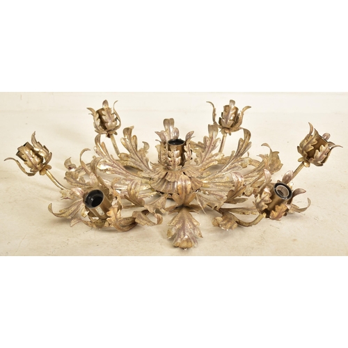 609 - An Italian inspired toleware style gilt metal six arm ceiling light. The chandelier having six arms ... 