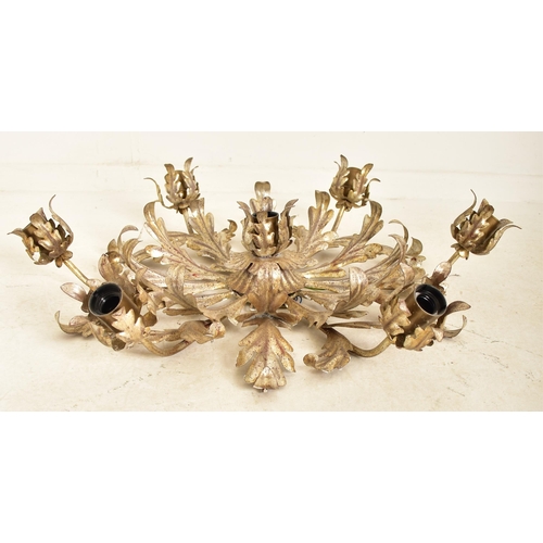 609 - An Italian inspired toleware style gilt metal six arm ceiling light. The chandelier having six arms ... 