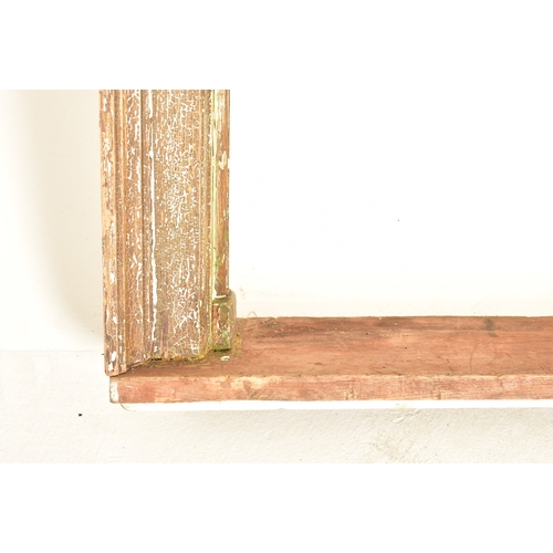 441 - A Victorian 19th century carved wood window frame. The frame in Gothic style with stepped frame. Rai... 