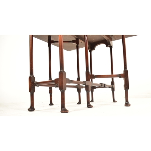 258 - A George III 18th century walnut spider leg drop leaf table. The table having straight drop leaf top... 